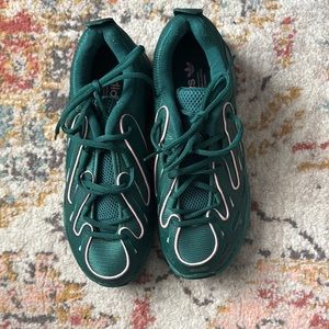 Green High-Top Sneakers with Textured Material and Prominent Lacing